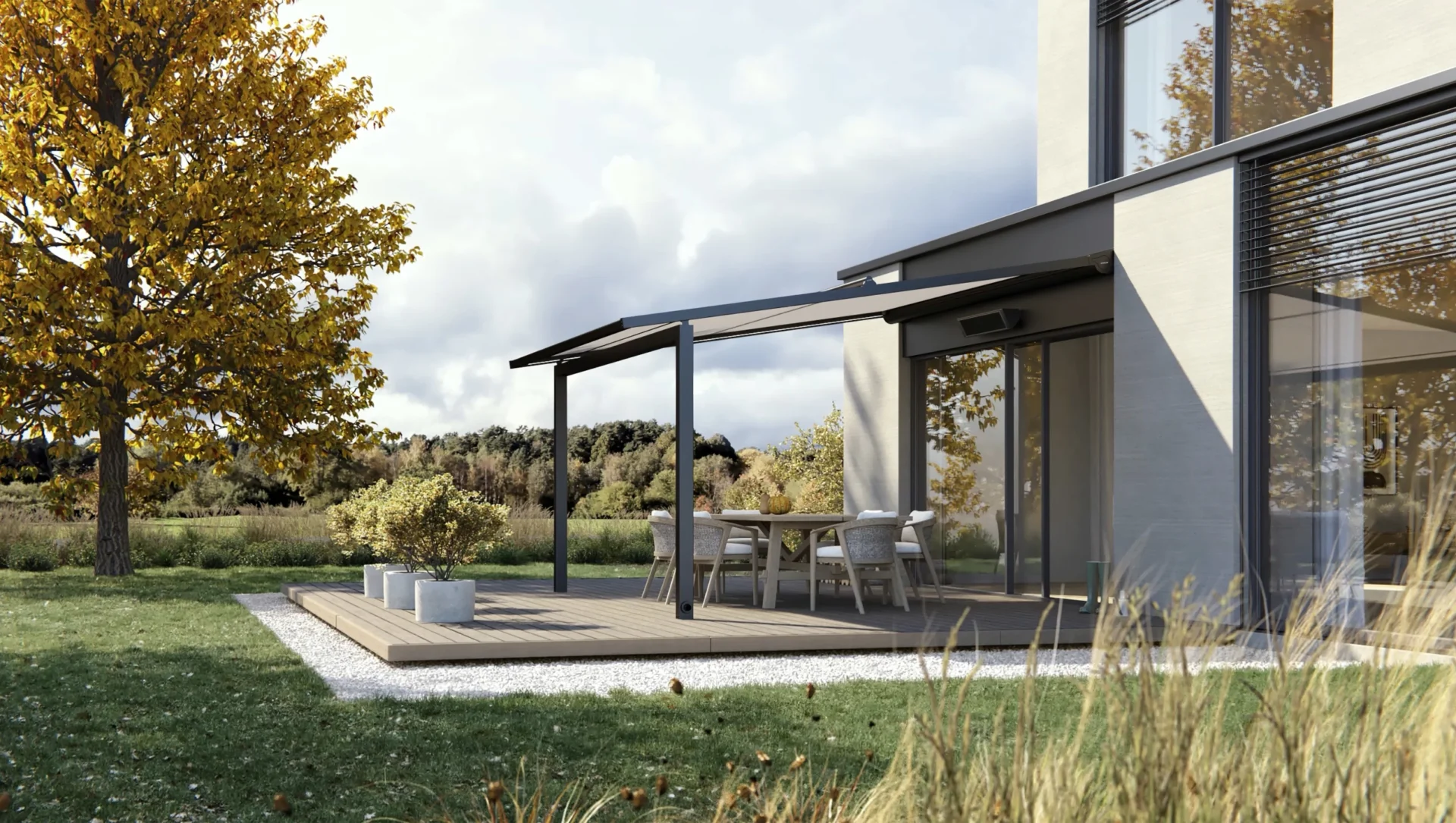 Moderne Terrasse mit Sonnenschutz vor einem Haus